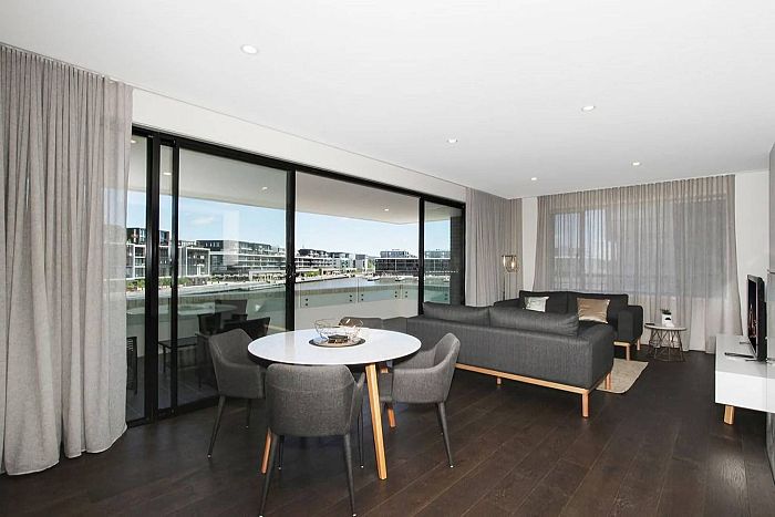 How are serviced apartments different to hotels?